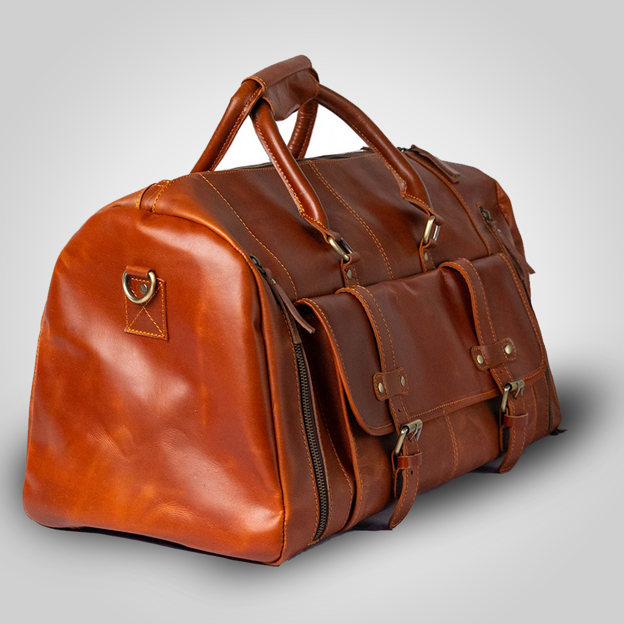 Side view of The Escape leather duffle bag showing shoe compartment and structured design
